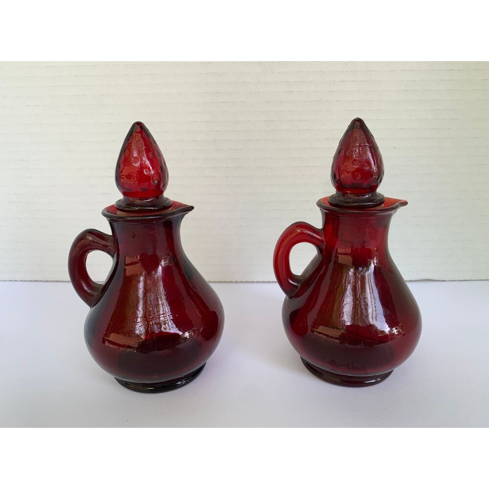 Pair Avon Ruby Red 5 1/4” Cruets with Strawberry Shaped Dimpled Stoppers 1971-72